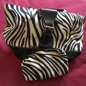 Handbag with matching makeup carrying case.